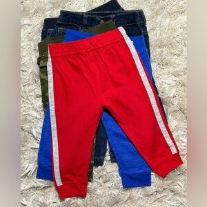 5 Garanimals pants. Size 12 months